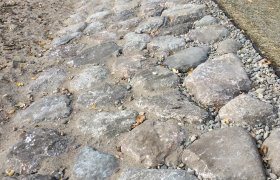 Set boulders used as riprap along a shoreline to prevent soil erosion