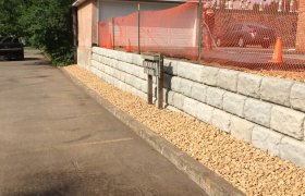 Newly constructed retaining wall from concrete blocks