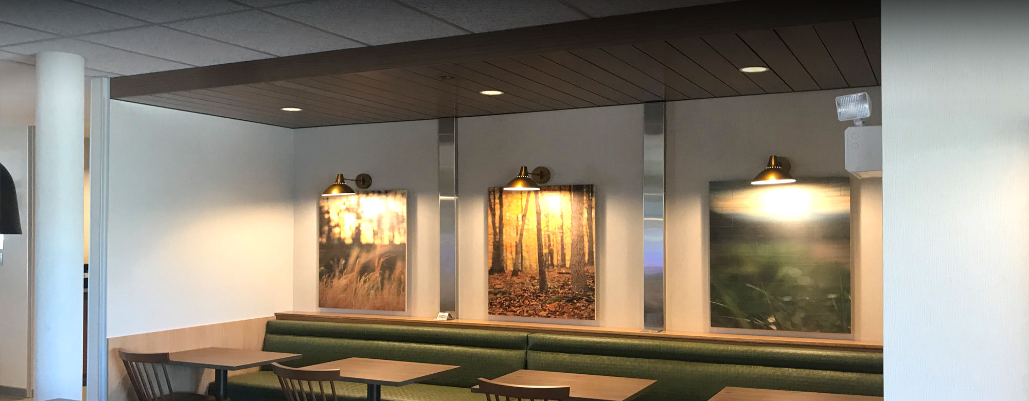 Wood style accoustical ceiling in the eating nook of a medical facility